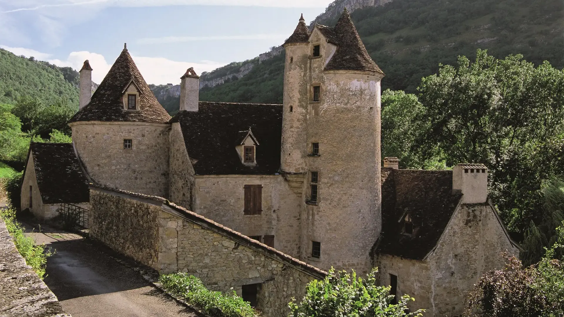 Autoire maison à tourelles