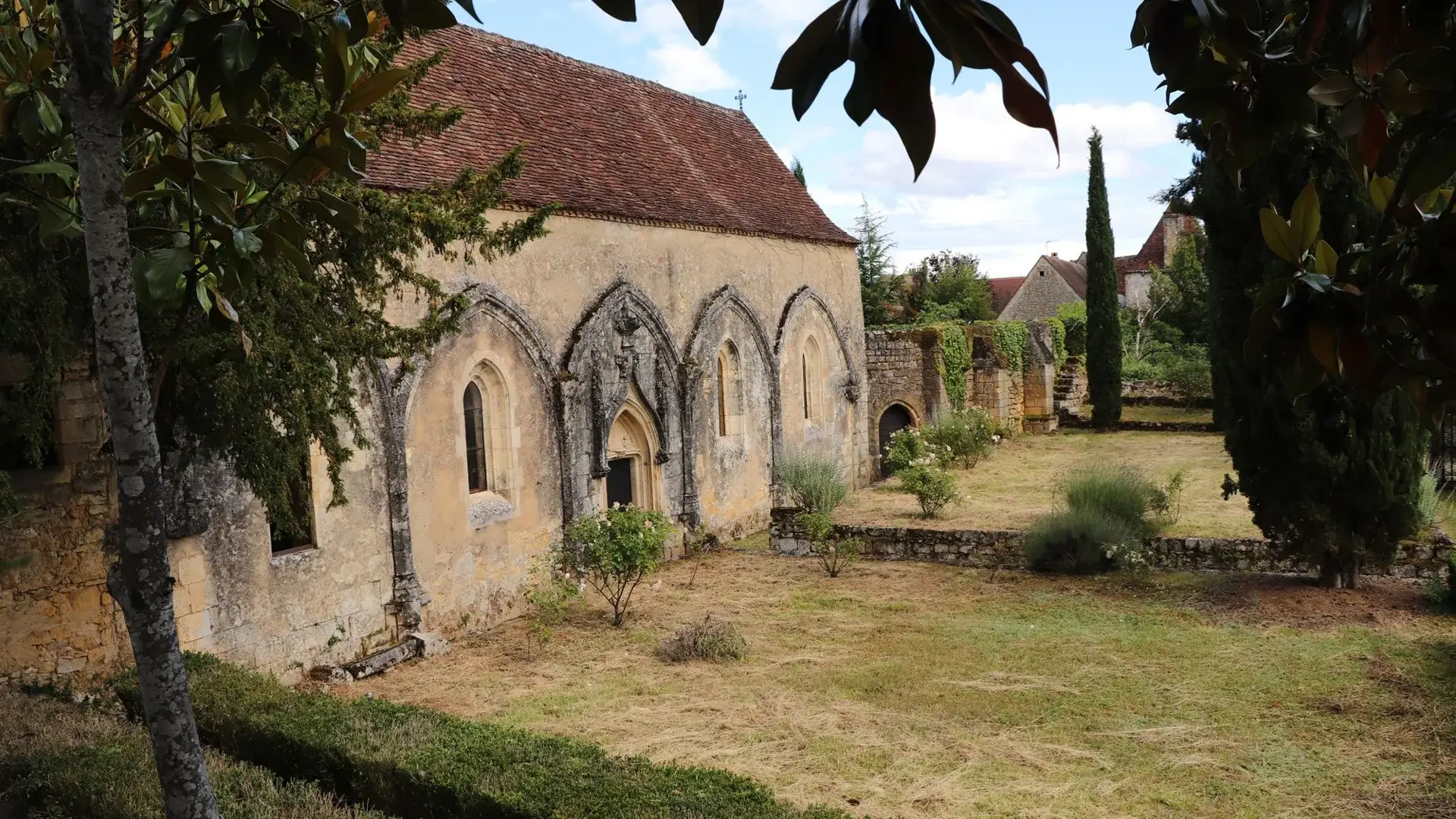 Domme jardins église